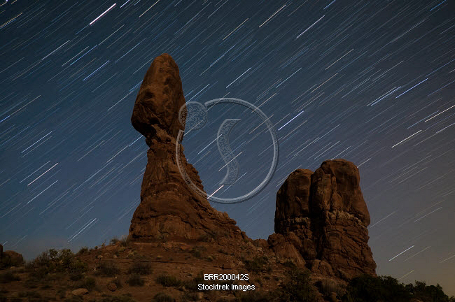 Balanced Rock Against A Backdrop Of Star Trails Arches National Park